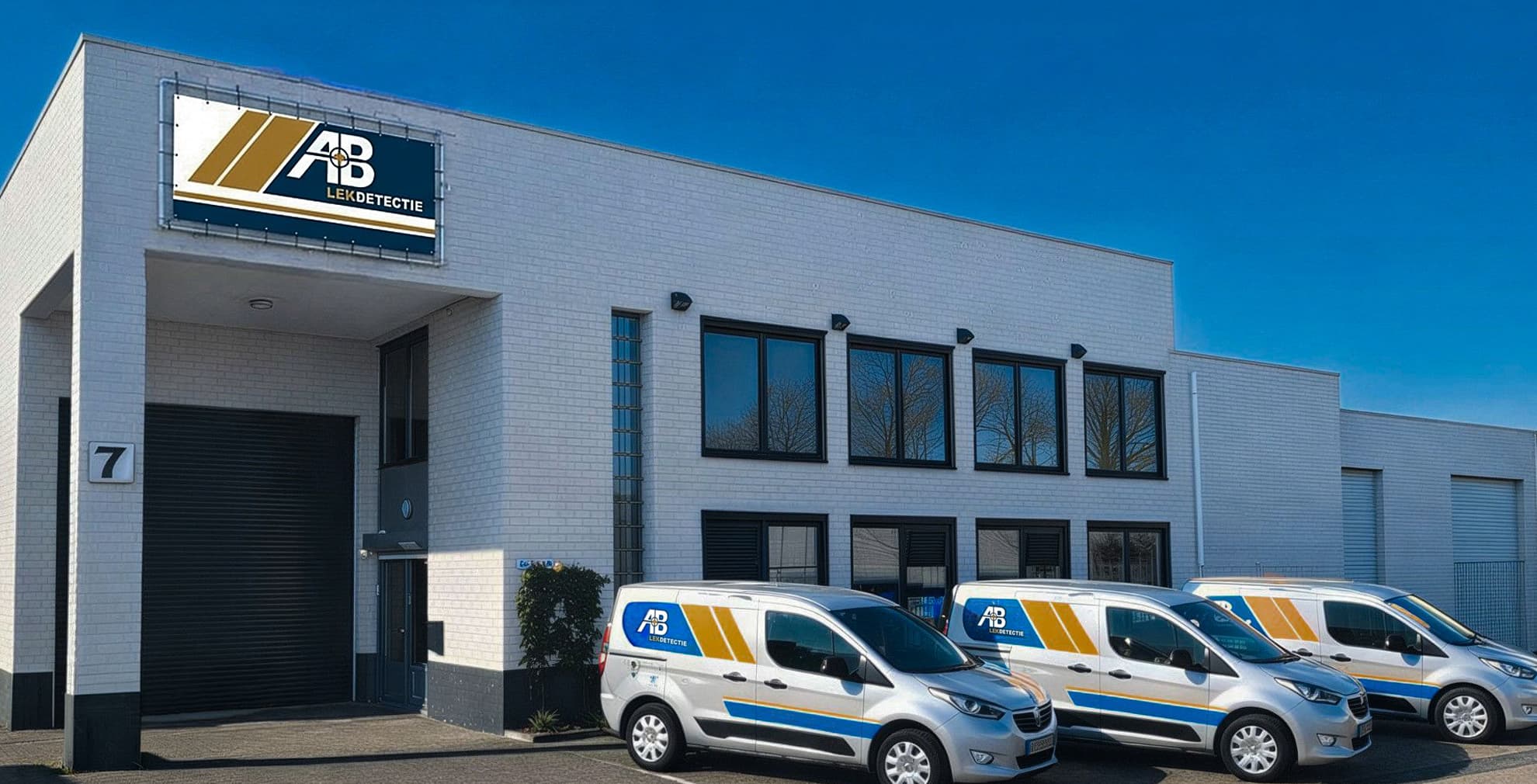 Person holding a FLIR thermal imaging camera close to the lens.